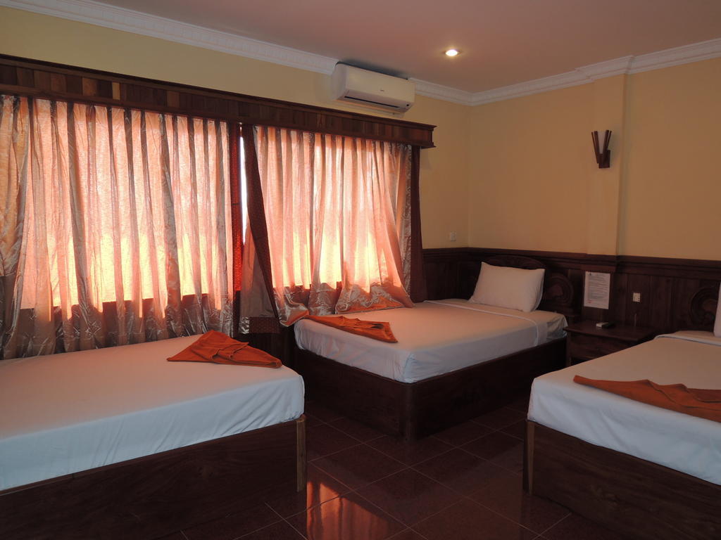 Banan Hotel Battambang Quarto foto