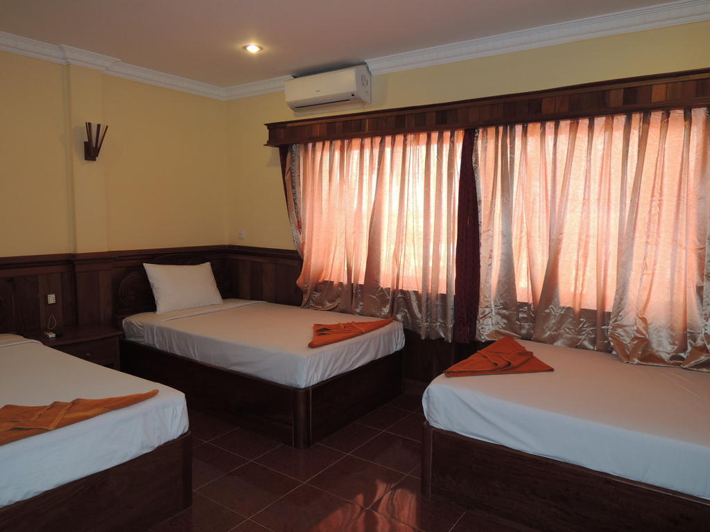 Banan Hotel Battambang Quarto foto