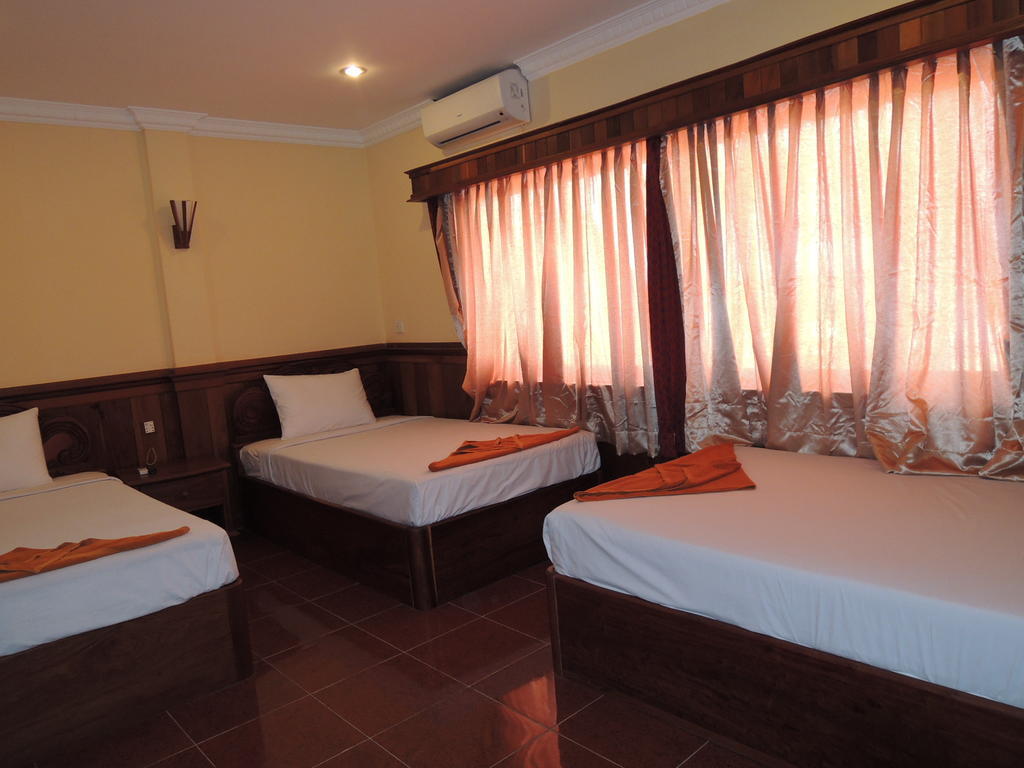 Banan Hotel Battambang Quarto foto